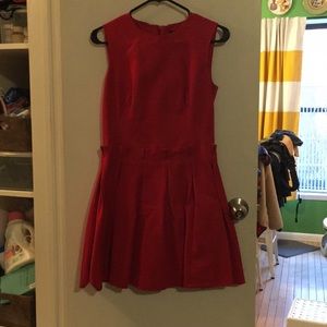 Sleeveless party dress with pleating at waist